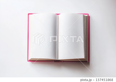 A beautifully arranged open book on a pristine white surface framed by a delicate pink border. A beautifully arranged open book on a pristine white surface framed by a delicate pink border. 137451868