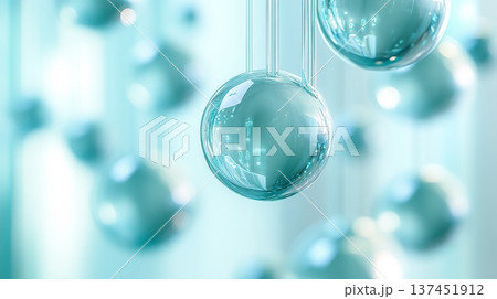 A Festive Collection of Shiny Blue Christmas Balls Elegantly Hanging from Delicate Strings in Warm Light A Festive Collection of Shiny Blue Christmas Balls Elegantly Hanging from Delicate Strings in Warm Light 137451912