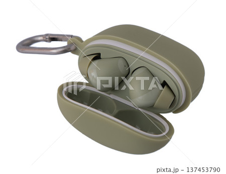 Wireless headphones isolated on white background. Wireless headphone in charging box with hook 137453790