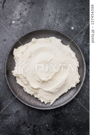 Creamy Homemade Mascarpone cheese, cream cheese. black background. top view 137454399
