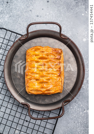 Danish pastry with a lemon jam, Puff pastry. grey background. top view 137454441