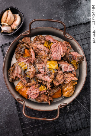 Braised Beef Cheek Stew, traditional Slow cooked meat. black background. top view 137454494