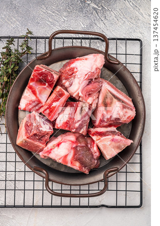 Raw Beef meat and veal bones for stew or goulash. grey background. top view 137454620