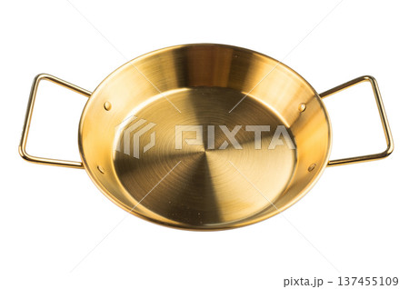Golden metal frying pan with two handles isolated on white background, clean empty cookware for kitchen and culinary use 137455109