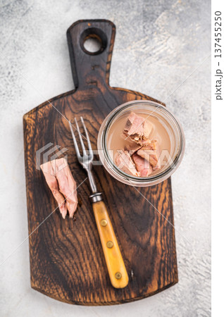 Versatile tinned canned tuna ready to elevate your recipes, from pasta dishes to hearty casseroles. white background. top view Versatile tinned canned tuna ready to elevate your recipes, from pasta dishes to hearty casseroles. white background. top view 137455250