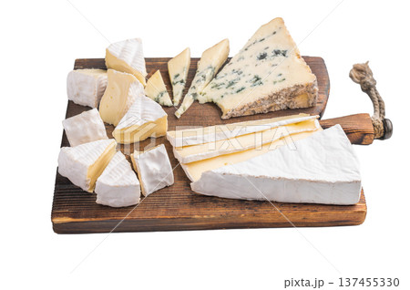 Assortment of Brie Camembert and Roquefort arranged on a rustic wooden board against a bright minimal background for a gourmet look. 137455330