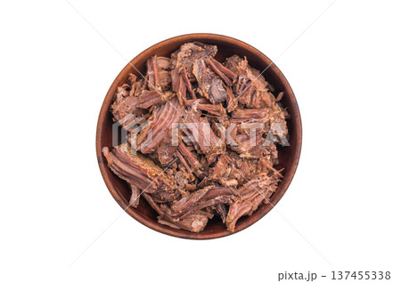Flavorful cooked moose deer meat in a rustic bowl over a minimal background, emphasizing hearty shredded texture and authentic wildness. 137455338