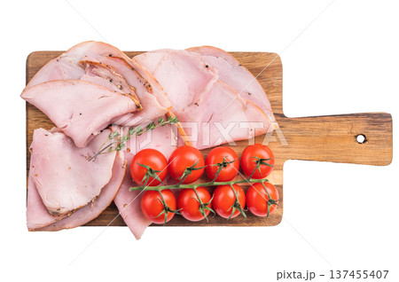 Cured pork slices Prosciutto with cherry tomatoes and thyme arranged on a wooden board over a clean white background ideal for commercial food use. Cured pork slices Prosciutto with cherry tomatoes and thyme arranged on a wooden board over a clean white background ideal for commercial food use. 137455407