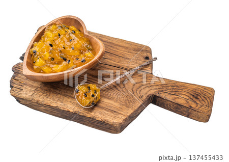 Granadilla and mango fruit jam in heart shaped dish, gourmet tropical condiment for desserts and breakfast Granadilla and mango fruit jam in heart shaped dish, gourmet tropical condiment for desserts and breakfast 137455433