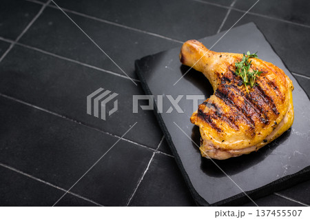 Grilled Glaze chicken legs, roasted poultry meat on black background, top view Grilled Glaze chicken legs, roasted poultry meat on black background, top view 137455507