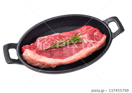 Premium raw striploin steak with rich color and texture, perfect for satisfying meat lovers at your next dinner. isolated on white background. top view Premium raw striploin steak with rich color and texture, perfect for satisfying meat lovers at your next dinner. isolated on white background. top view 137455799