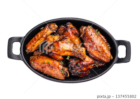 Grilled chicken wings smothered in sweet and sour sauce, poultry meat. isolated on white background. top view 137455802