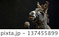 Adorable donkey singing song in microphone in music studio. Banner with donkey musician on black background with copy space 137455899