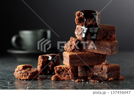 Brownie pieces on a black background. 137456047