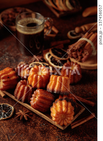 Cinnamon cakes and mug of black coffee. 137456057