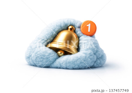 A golden bell with a notification in a soft fluffy nest. 137457749