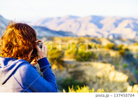 Woman take photos from Tabernas desert in Spain 137458784