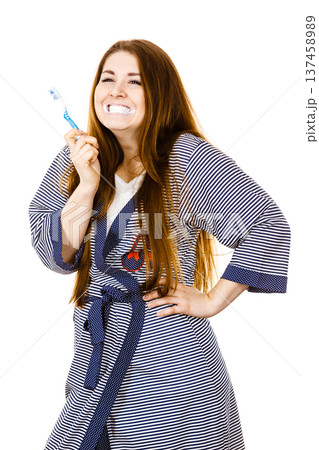Woman brushing cleaning teeth. 137458989