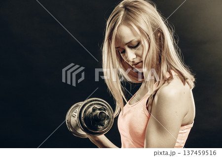 Fitness sporty girl lifting weights Fitness sporty girl lifting weights 137459516