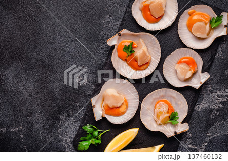 Raw scallops with lemon parsley Raw scallops with lemon parsley 137460132