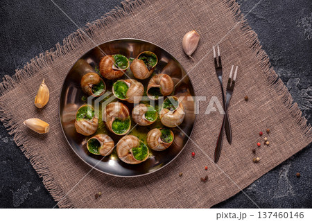 Bourgogne Escargot Snails with herb garlic oil. Bourgogne Escargot Snails with herb garlic oil. 137460146