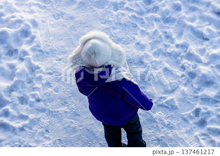 tourist wearing winter hat with earflaps outdoors 137461217