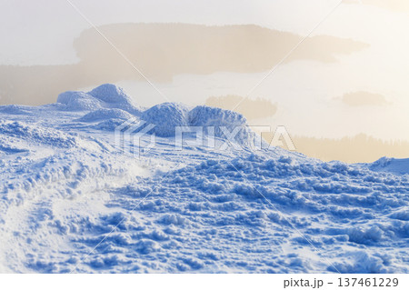 snow covered cliff and Kandalaksha bay in haze snow covered cliff and Kandalaksha bay in haze 137461229