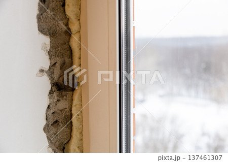 slit after installing plastic window frame slit after installing plastic window frame 137461307