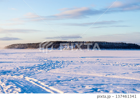 snowy surface of Kandalaksha bay at winter morning snowy surface of Kandalaksha bay at winter morning 137461341