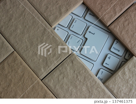 Part Of White Keypad Inside Decorative Brickwork. Stock Photo For Antivirus Illustration Part Of White Keypad Inside Decorative Brickwork. Stock Photo For Antivirus Illustration 137461375
