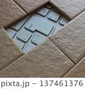 The enter key is visible through a hole in a solid brick wall. Information Security Concept Stock Photo 137461376