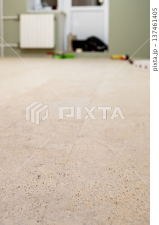 freshly laid cork flooring in room 137461405