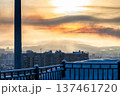 sun in sunset sky over Murmansk city in winter 137461720