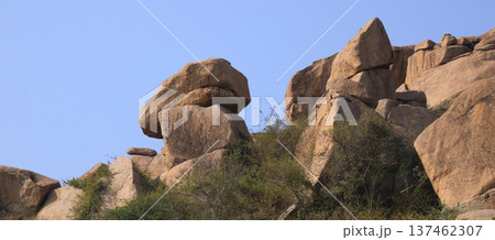 Big granite boulders in Basapur, Hampi, India. 137462307