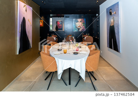 Luxurious private event ambiance. Highend private gathering featuring artistic touches and cozy setting Luxurious private event ambiance. Highend private gathering featuring artistic touches and cozy setting 137462584
