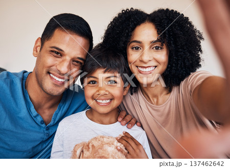 Family, parents and child, happiness and selfie, bonding with memory at home, love and trust with care. Smile in picture, social media and mother, father and kid relax with photography and post 137462642