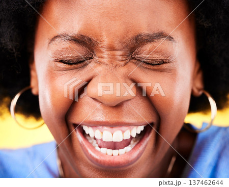 Zoom of excited, happy and face of black woman on yellow background for good news, wow and surprise. Emoji, winner and person in studio with big smile for announcement, winning and omg expression Zoom of excited, happy and face of black woman on yellow background for good news, wow and surprise. Emoji, winner and person in studio with big smile for announcement, winning and omg expression 137462644