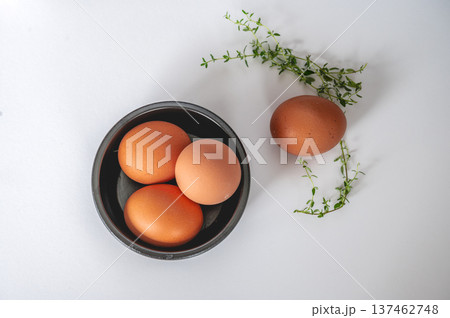 Natural Eggs in Black Bowl -White Interior Natural Eggs in Black Bowl -White Interior 137462748