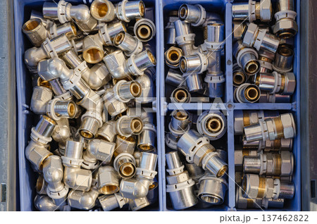 Plumbing Hardware in Storage Boxes 137462822