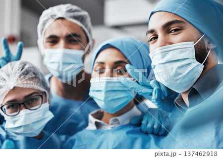 Healthcare, teamwork and surgery, selfie in operating room in medical emergency at hospital. Face of doctor, nurses and surgical team taking picture in operation with ppe, face mask and scrubs. Healthcare, teamwork and surgery, selfie in operating room in medical emergency at hospital. Face of doctor, nurses and surgical team taking picture in operation with ppe, face mask and scrubs. 137462918