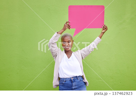 Black woman, speech bubble and portrait for poster, space or mockup with opinion by green wall background. African girl, billboard and paper with voice, vote and social network for feedback review 137462923