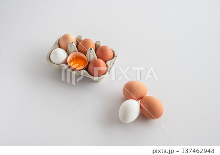 Fresh Farm Eggs with One Cracked Open 137462948