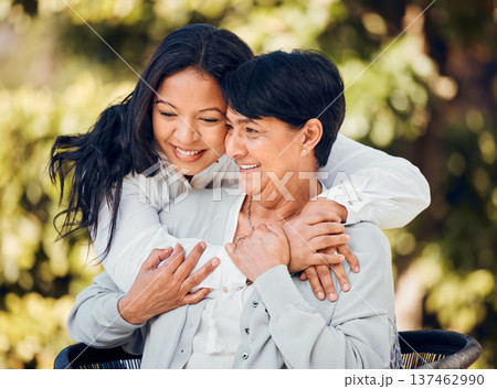 Woman, hug and mature mother in garden with love on mothers day or women bonding with care for mom in retirement. Happy, family and embrace outdoor, backyard or together on holiday or vacation Woman, hug and mature mother in garden with love on mothers day or women bonding with care for mom in retirement. Happy, family and embrace outdoor, backyard or together on holiday or vacation 137462990