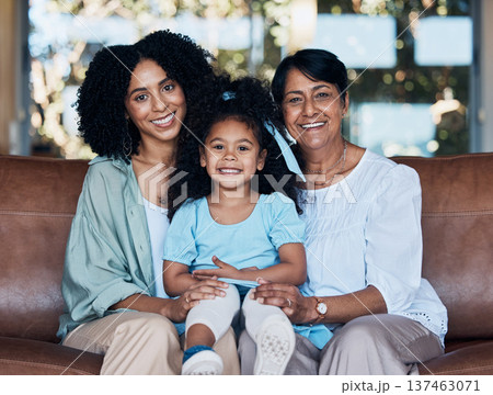 Grandma, mom and girl on sofa, portrait and smile with care, love and bonding in family house. Grandmother, mother and daughter with generations, embrace and happy for memory, living room and home Grandma, mom and girl on sofa, portrait and smile with care, love and bonding in family house. Grandmother, mother and daughter with generations, embrace and happy for memory, living room and home 137463071