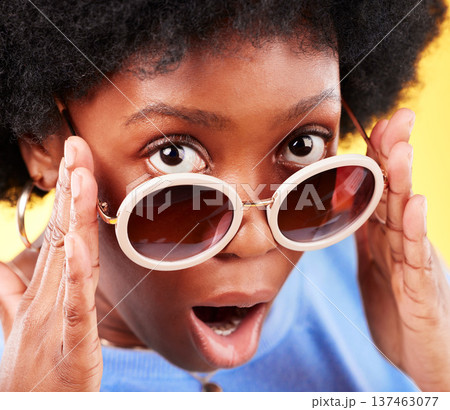 Surprise, black woman and shock on face with sunglasses, fashion and crazy sale, deal or offer in studio background. Confused, face and African person with shocked, wow or emoji for promotion Surprise, black woman and shock on face with sunglasses, fashion and crazy sale, deal or offer in studio background. Confused, face and African person with shocked, wow or emoji for promotion 137463077