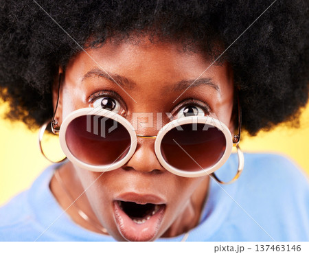 Surprise, black woman and shock on face with sunglasses, fashion and crazy sale, deal or offer in studio background. Confused, portrait and African person with shocked, wow or emoji for promotion Surprise, black woman and shock on face with sunglasses, fashion and crazy sale, deal or offer in studio background. Confused, portrait and African person with shocked, wow or emoji for promotion 137463146