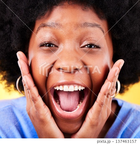 Closeup of excited, surprise and portrait of black woman on yellow background for good news, wow and happy. Emoji, winner and face of person with big smile for announcement, winning and omg in studio Closeup of excited, surprise and portrait of black woman on yellow background for good news, wow and happy. Emoji, winner and face of person with big smile for announcement, winning and omg in studio 137463157