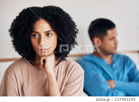 Frustrated couple, fight and conflict in divorce, argument or disagreement on bed from dispute at home. Upset woman and man in breakup, cheating affair or toxic relationship in bedroom at the house 137463245