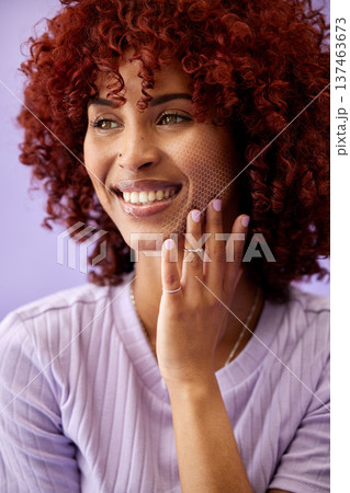 Beauty, wellness and young woman in a studio with natural, health and glamour face routine. Self care, makeup and female model from Mexico with facial cosmetics treatment by a purple background. Beauty, wellness and young woman in a studio with natural, health and glamour face routine. Self care, makeup and female model from Mexico with facial cosmetics treatment by a purple background. 137463673