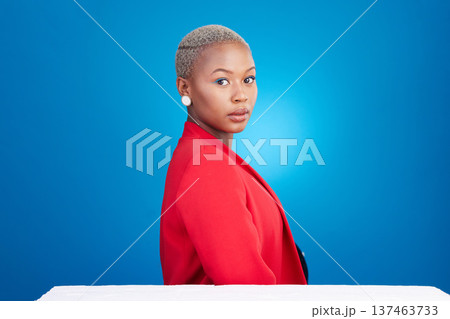 Makeup, serious and portrait of black woman in studio with cosmetic, glamour and face routine. Confidence, headshot and young African female model with cosmetology facial treatment by blue background 137463733